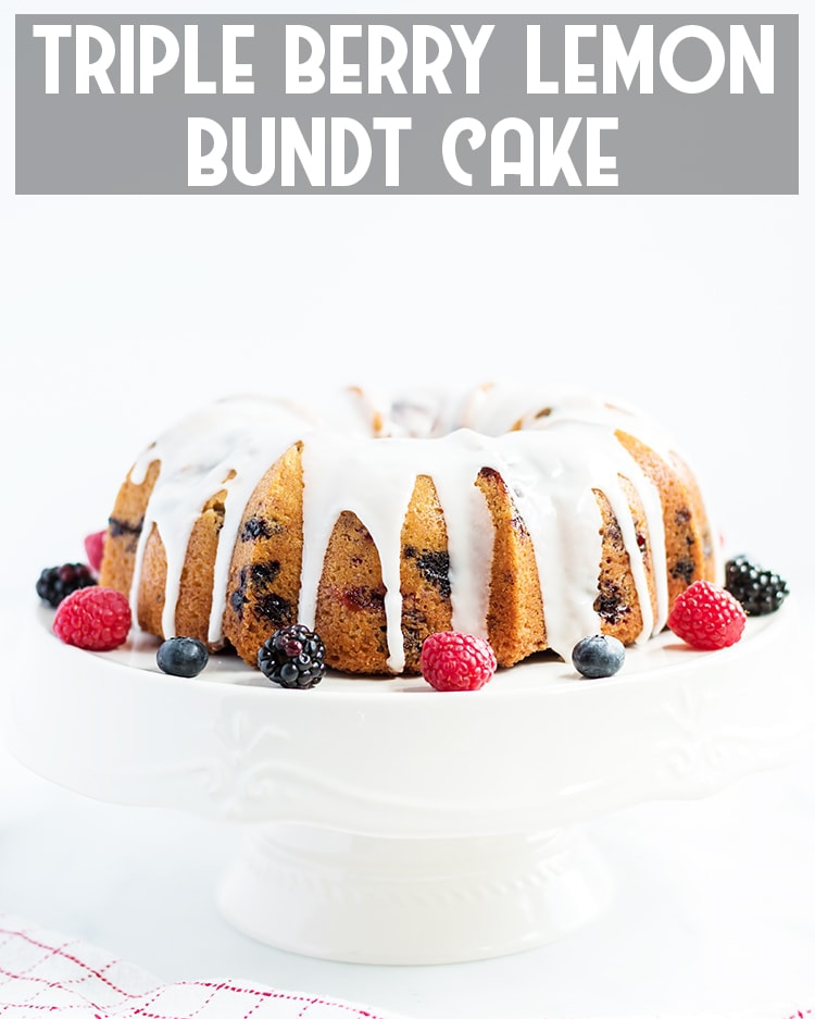 Berry Lemon Bundt Cake on a white cake stand with text overlay for pinterest