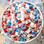 Red, White and Blue Muddy Buddies in a big white bowl.