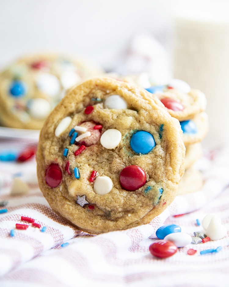 Cookies filled with white chocolate chips, red, white and blue m&ms and sprinkles