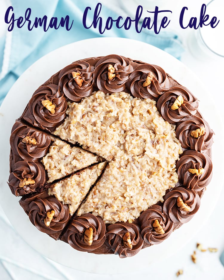 A German Chocolate Cake from above with coconut pecan frosting, and chocolate buttercream rosettes on the edges.