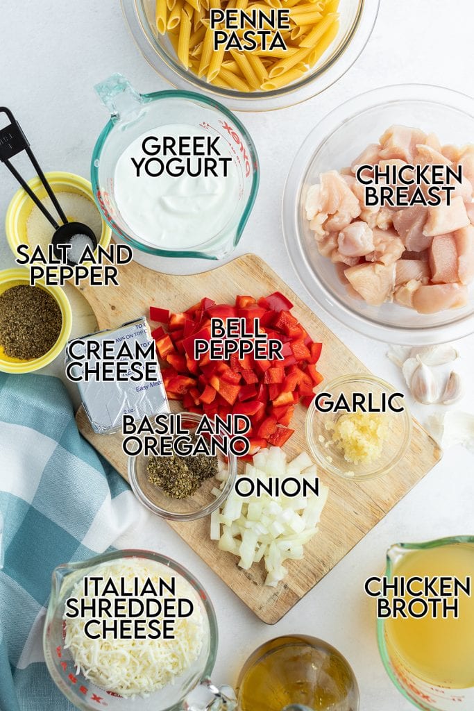 An overhead photo of the ingredients needed to make one pot cheesy chicken pasta.