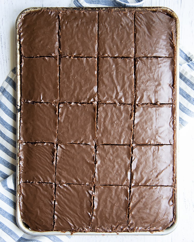 A chocolate texas sheet cake cut into 20 slices