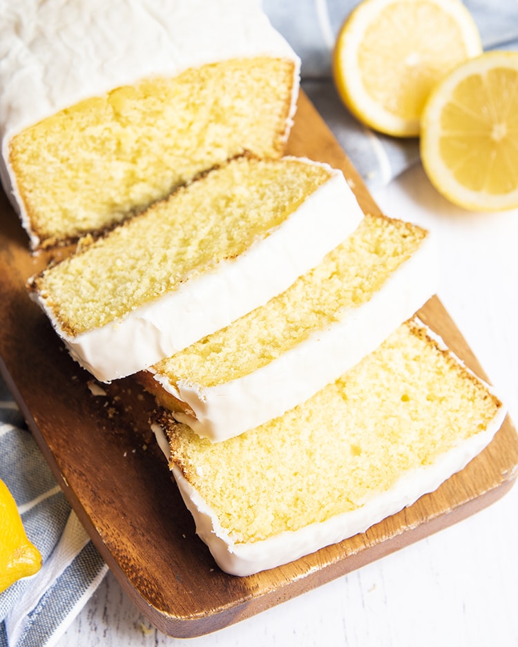 Slices of lemon loaf on a cutting board