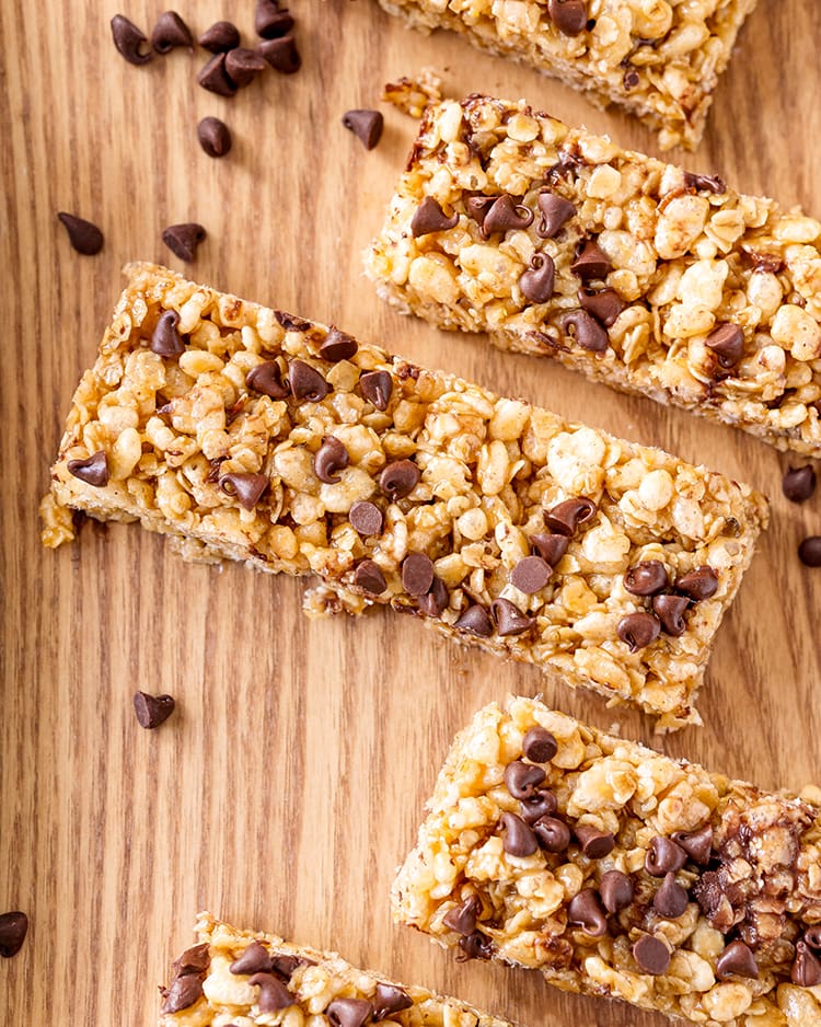 Peanut Butter Granola Bars with chocolate chips on a wooden board