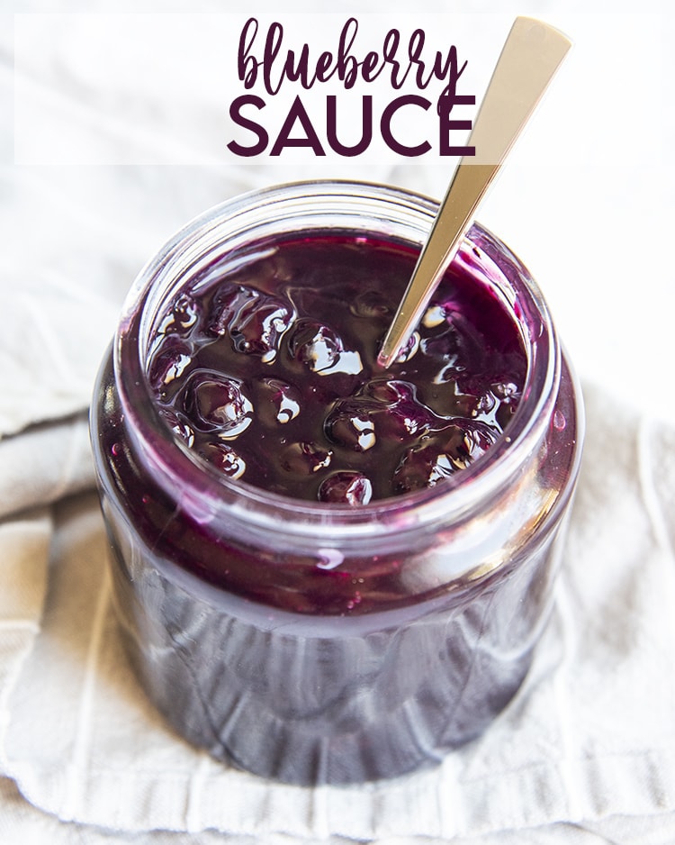 Blueberry sauce in a jar with text overlay for pinterest