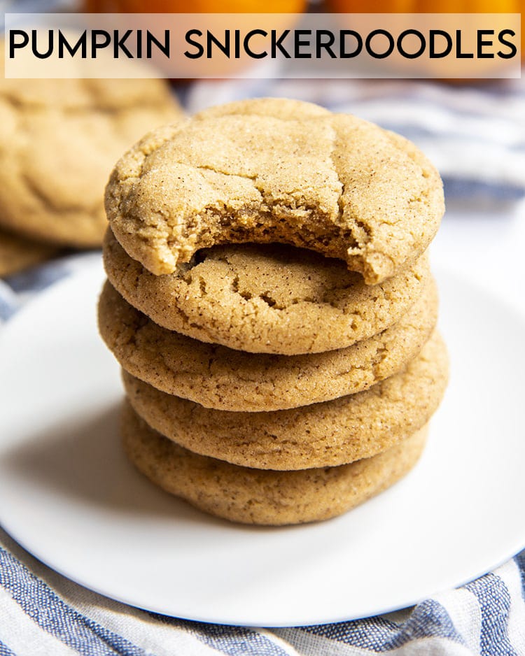 A stack of pumpkin snickerdoodle cookies. The top cookie has a bite taken out of it with text overlay for pinterest.