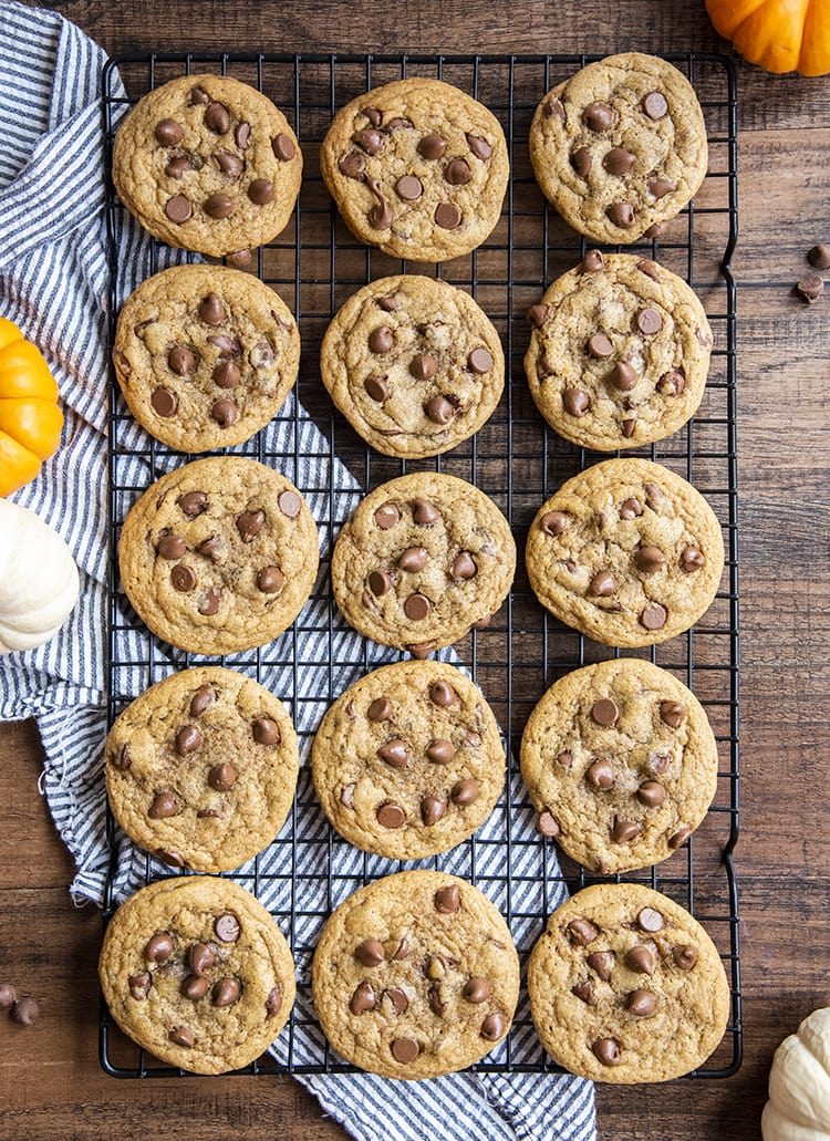 Chewy Pumpkin Chocolate Chip Cookies on a cooling rack.