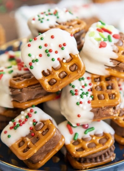 A close up of a plateful of candy bar pretzel bites.