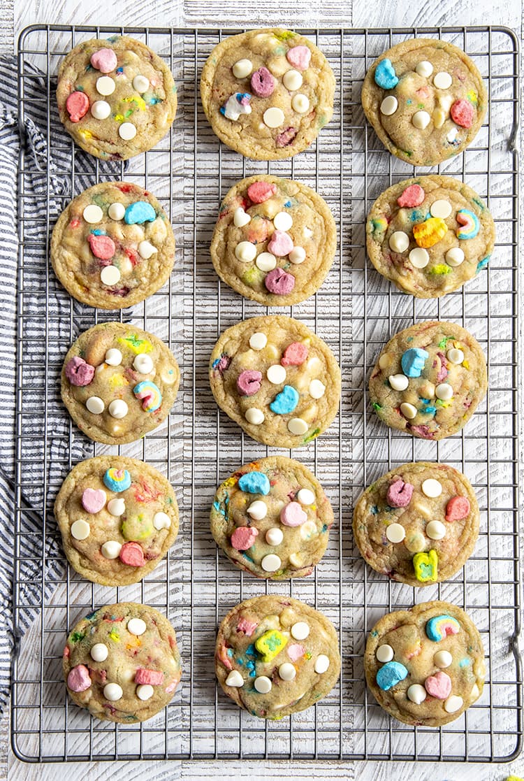 Lucky charms cookies arranged in rows on a cooling rack.