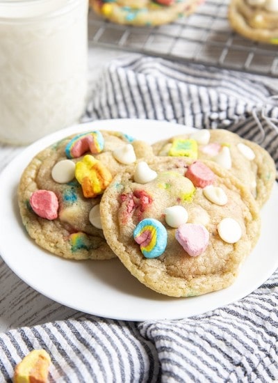 A plate of food on a table, with Cookie and Lucky Charms