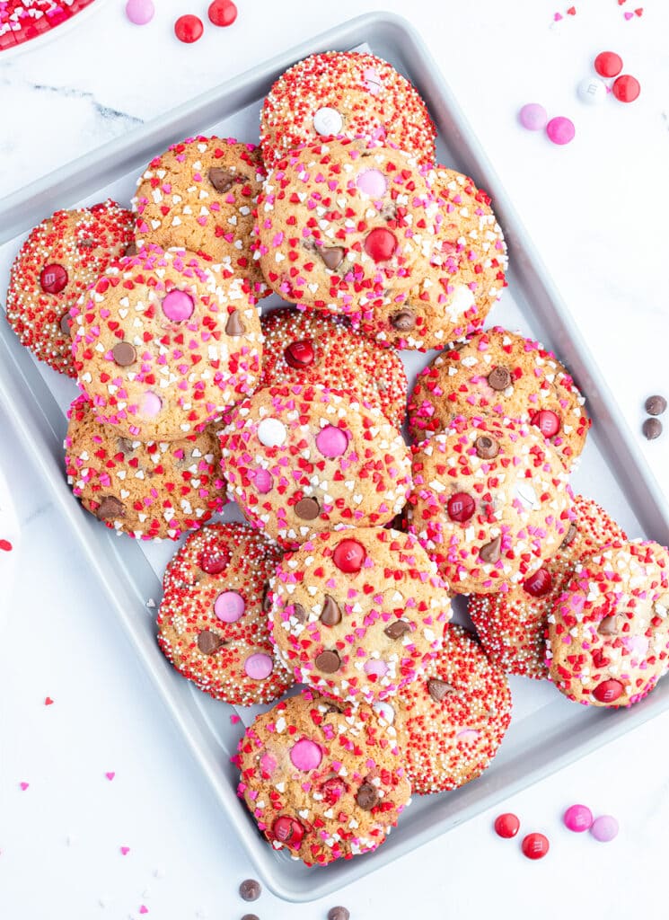 A pan of Valentine sprinkle and M&M cookies.