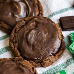 Chocolate cookies with an Andes mint ganache on top.