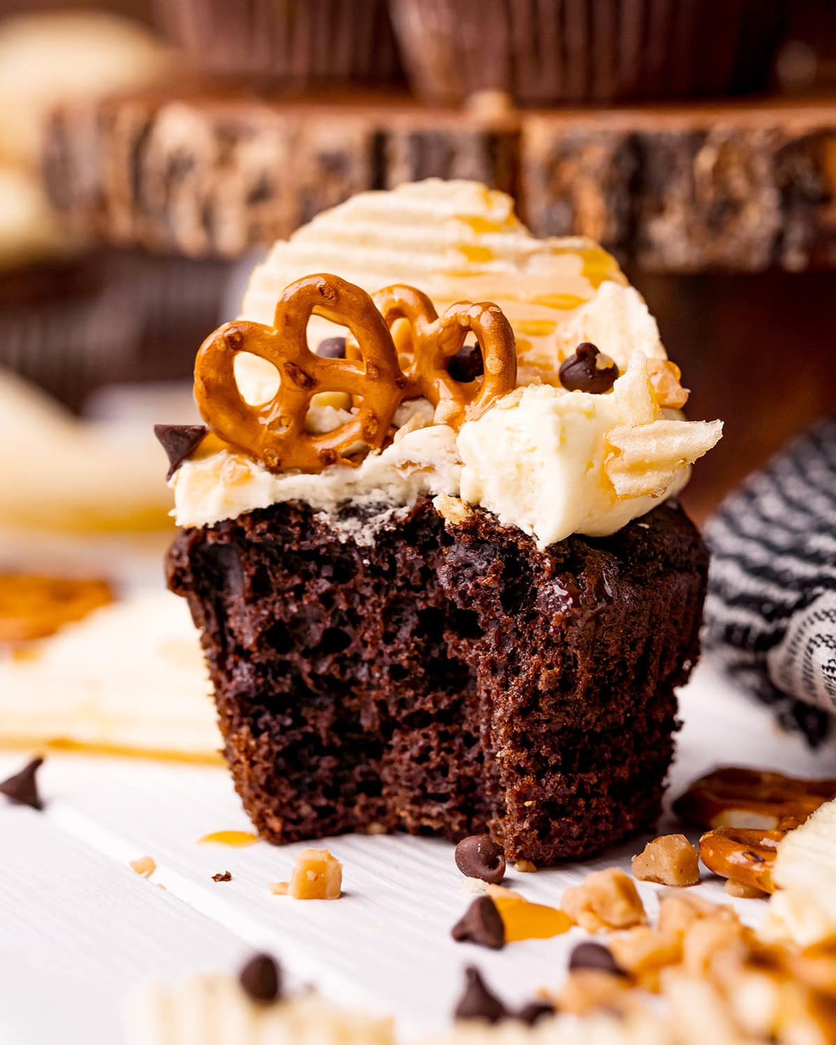 A bite into a kitchen sink cupcake showing the middle of the cupcake.