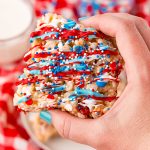 A hand holding a 4th of July Rice Krispie Treat