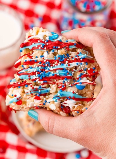 A hand holding a 4th of July Rice Krispie Treat