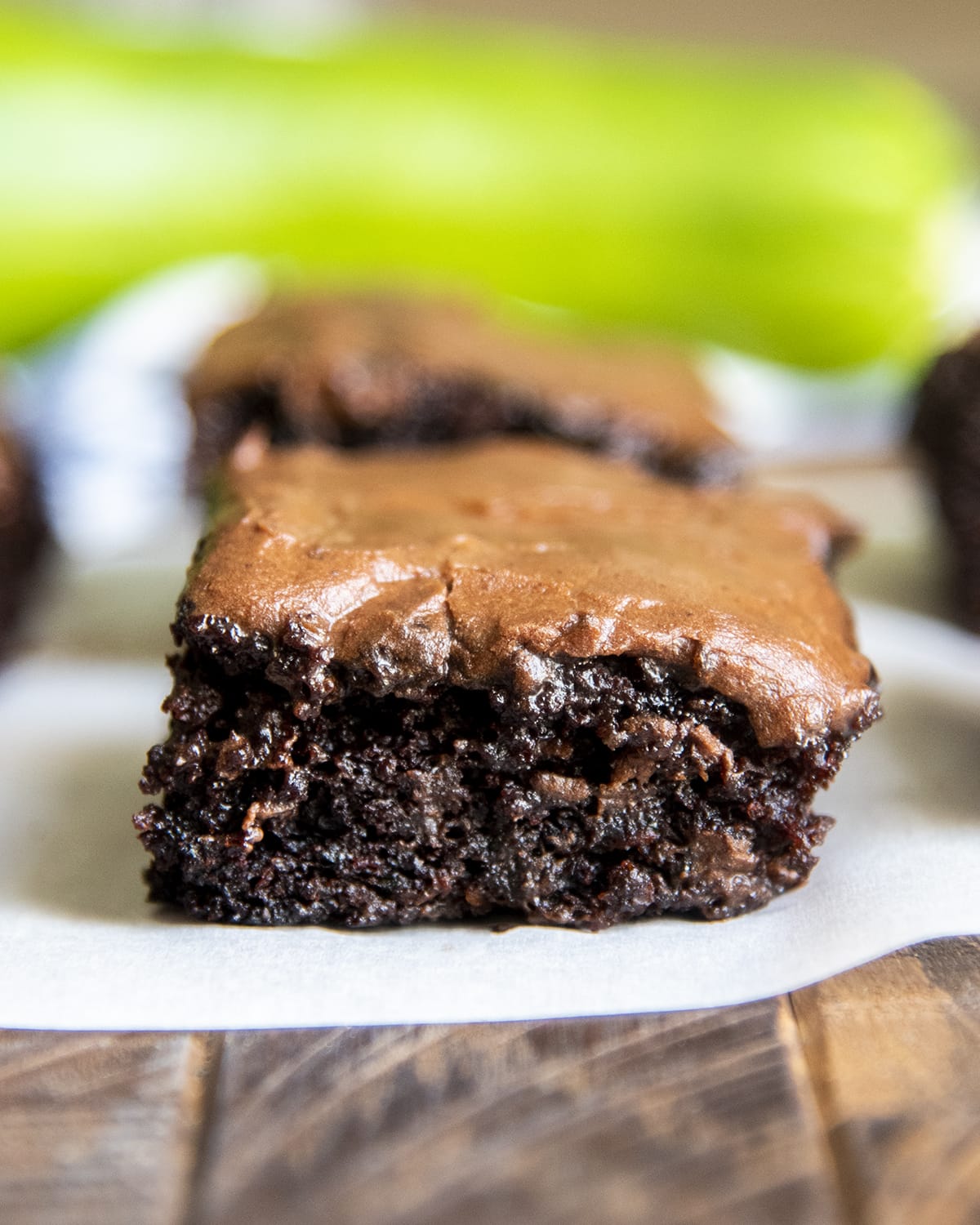 A chocolate zucchini brownie topped with chocolate icing.