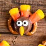A pretzel topped with a rolo, and candy corn, and candy eyes to look like a turkey.