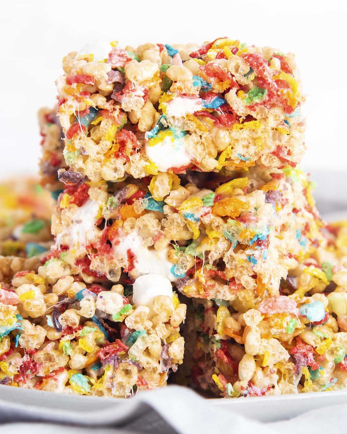 A pile of fruity pebbles rice krispie treats.