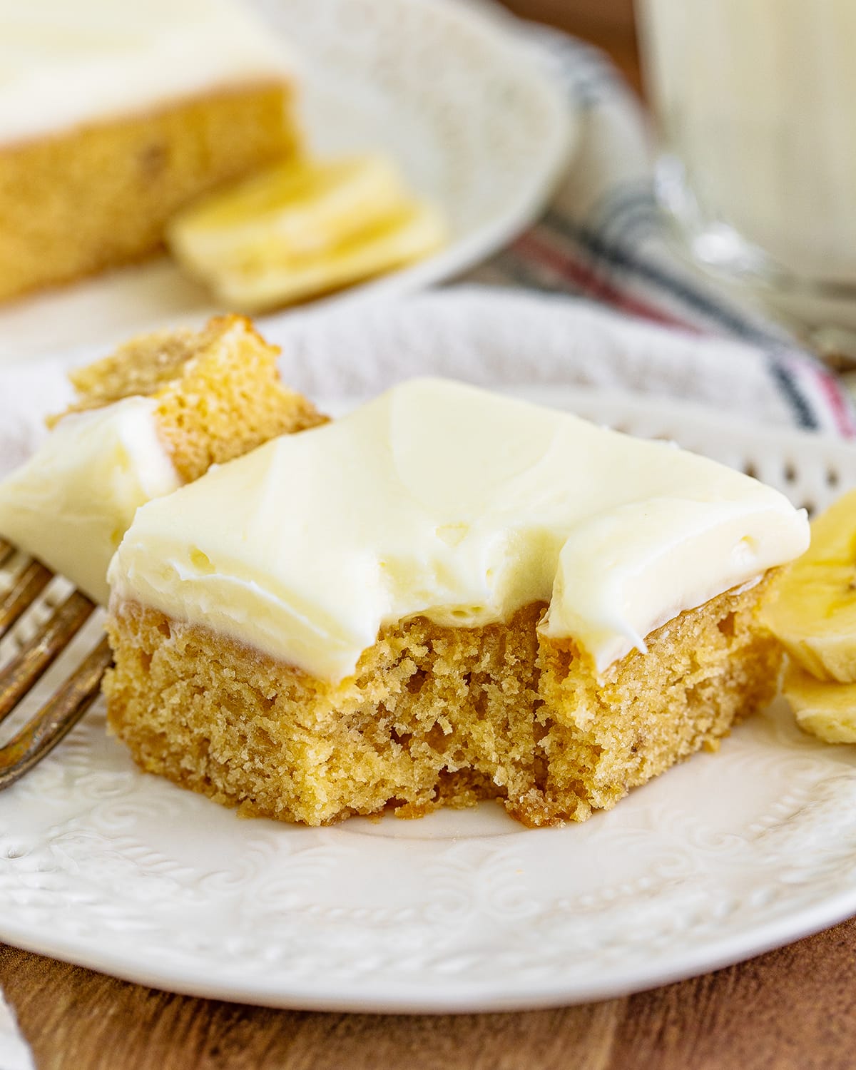 A banana blondie on a white plate.