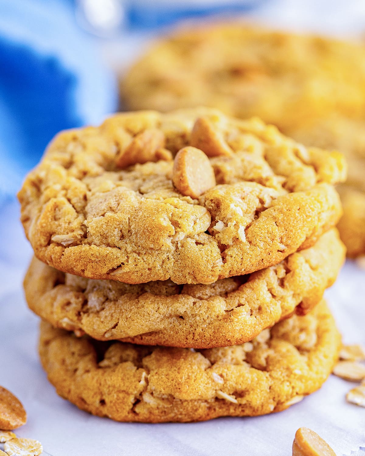 A stack of three peanut butter oatmeal cookies.