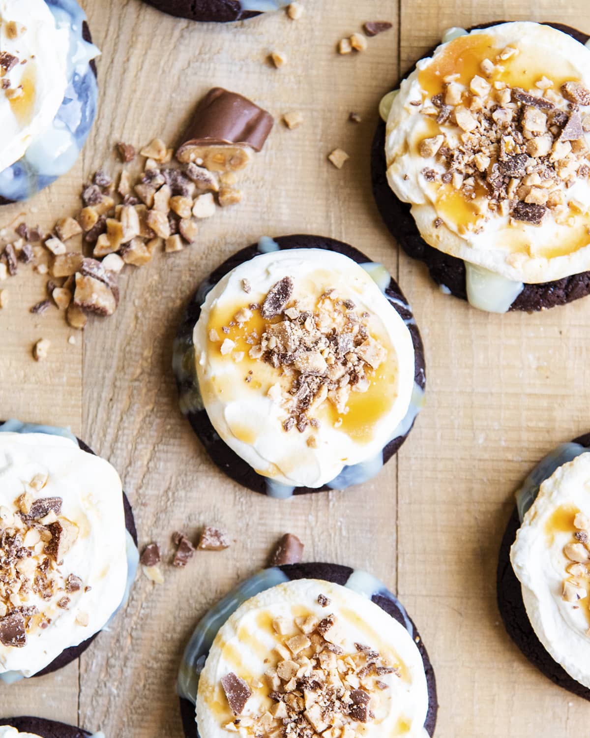 An overhead photo of Better than Sex Chocolate cookies on a wooden board.