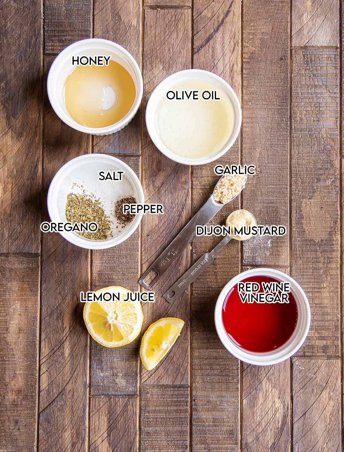 The ingredients needed to make red wine vinaigrette. 