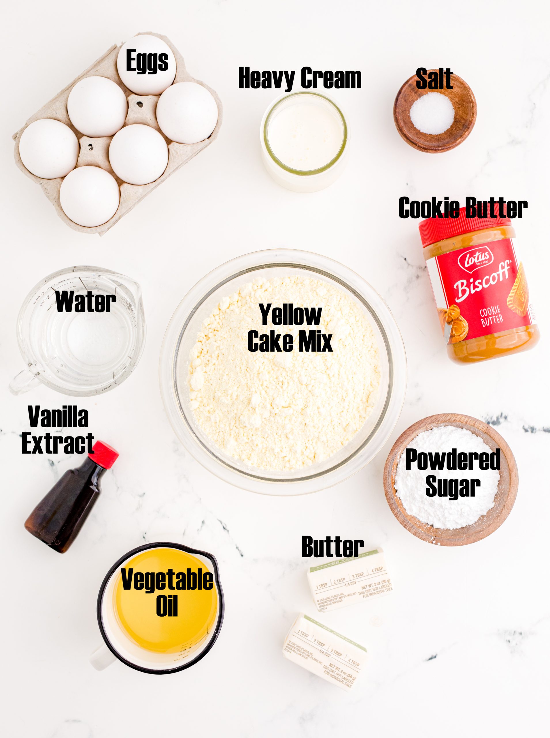 A labeled photo of the ingredients needed to make Biscoff Cupcakes.
