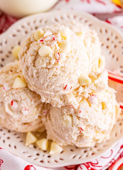 Scoops of peppermint candy cane cookie dough on a white plate.