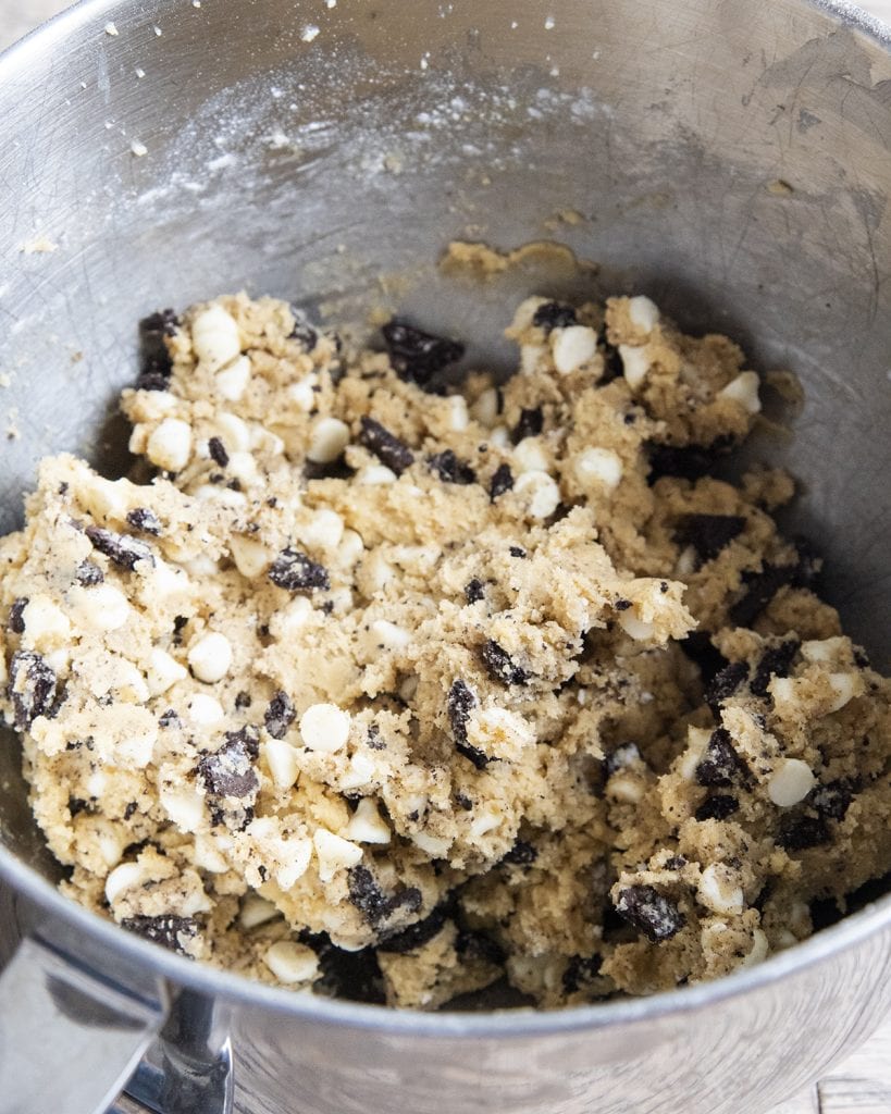 A bowl of Oreo and white chocolate chip filled cookie dough.