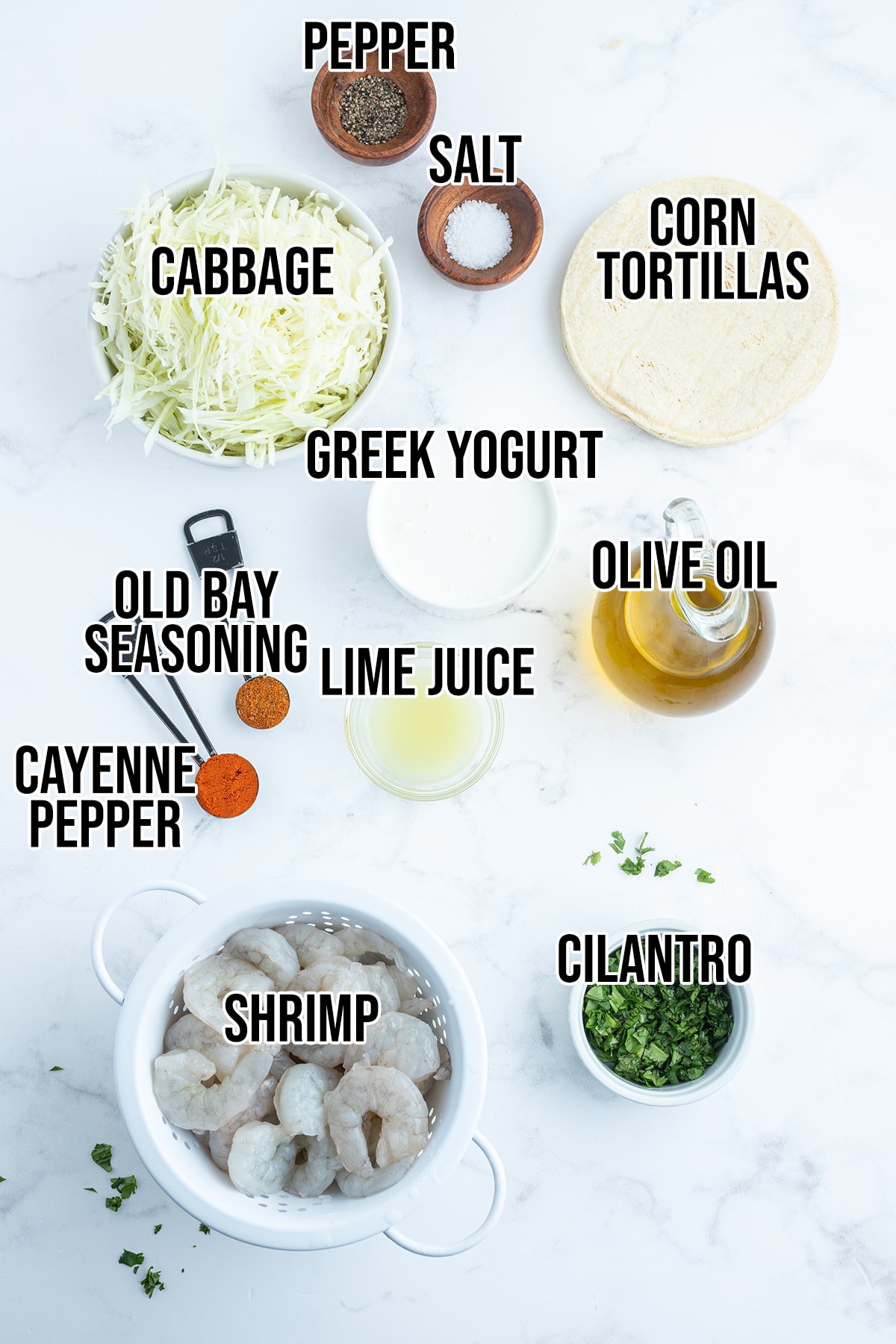 An overhead photo of the ingredients needed to make Shrimp tacos.