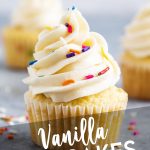A vanilla cupcake topped with vanilla buttercream with a text block over the top for pinterest.