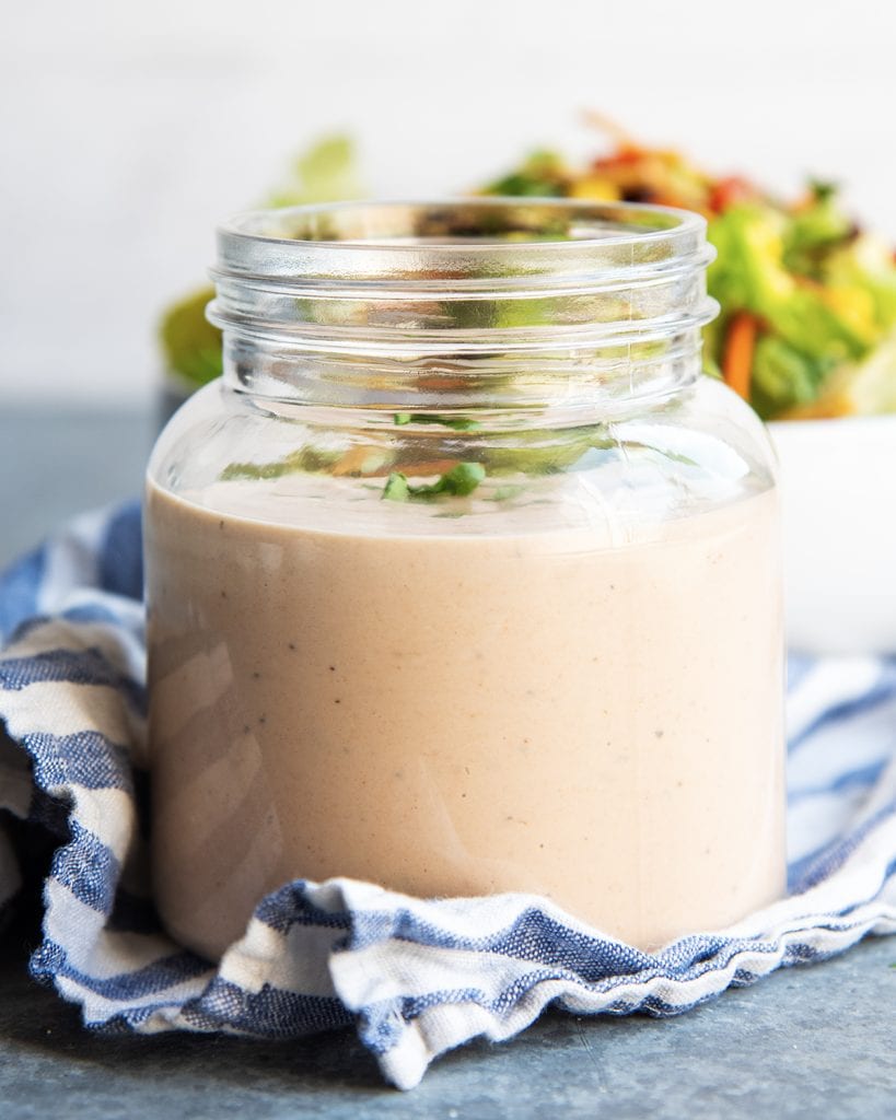 A glass jar of BBQ Ranch dressing.