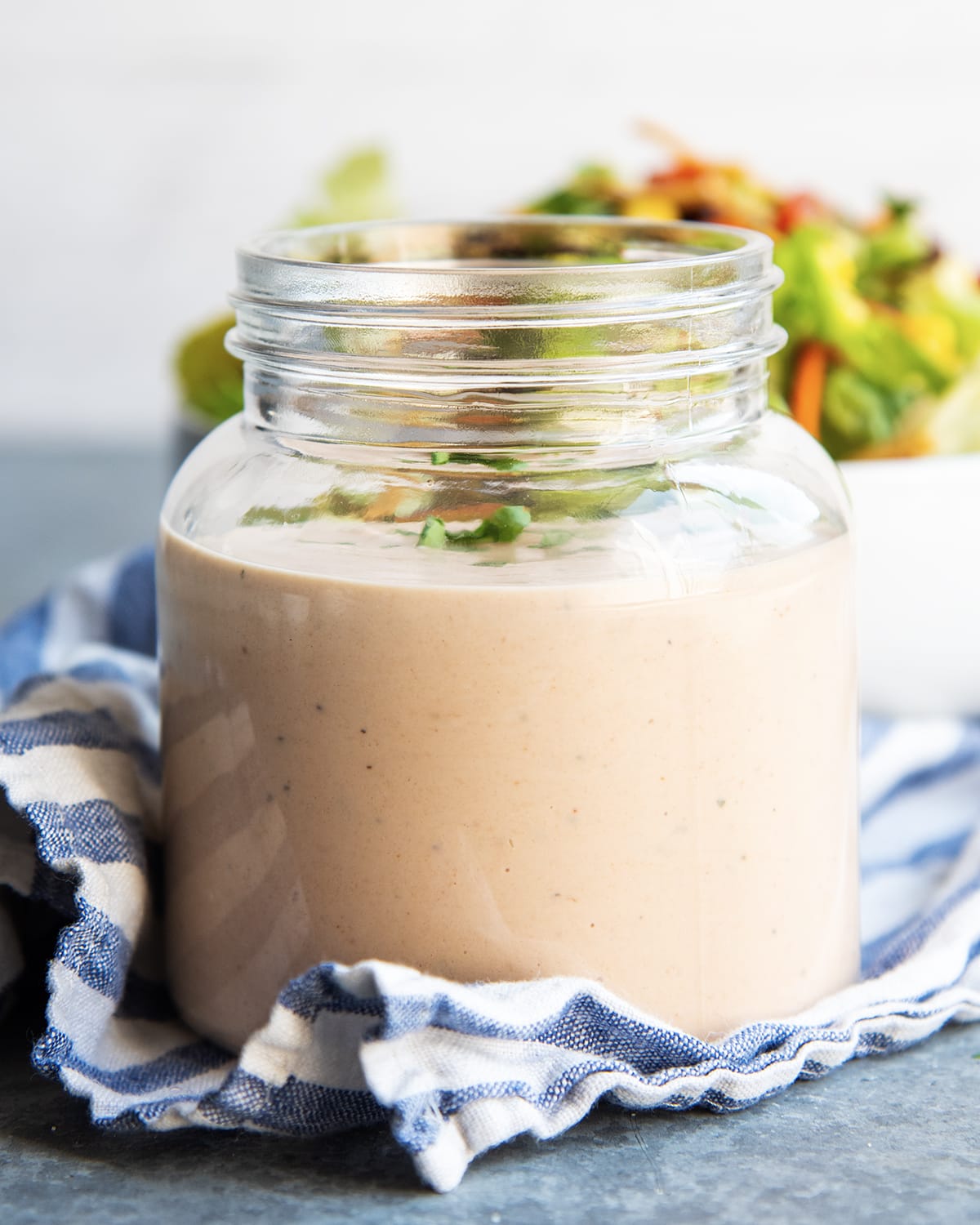 A glass jar of BBQ Ranch dressing.