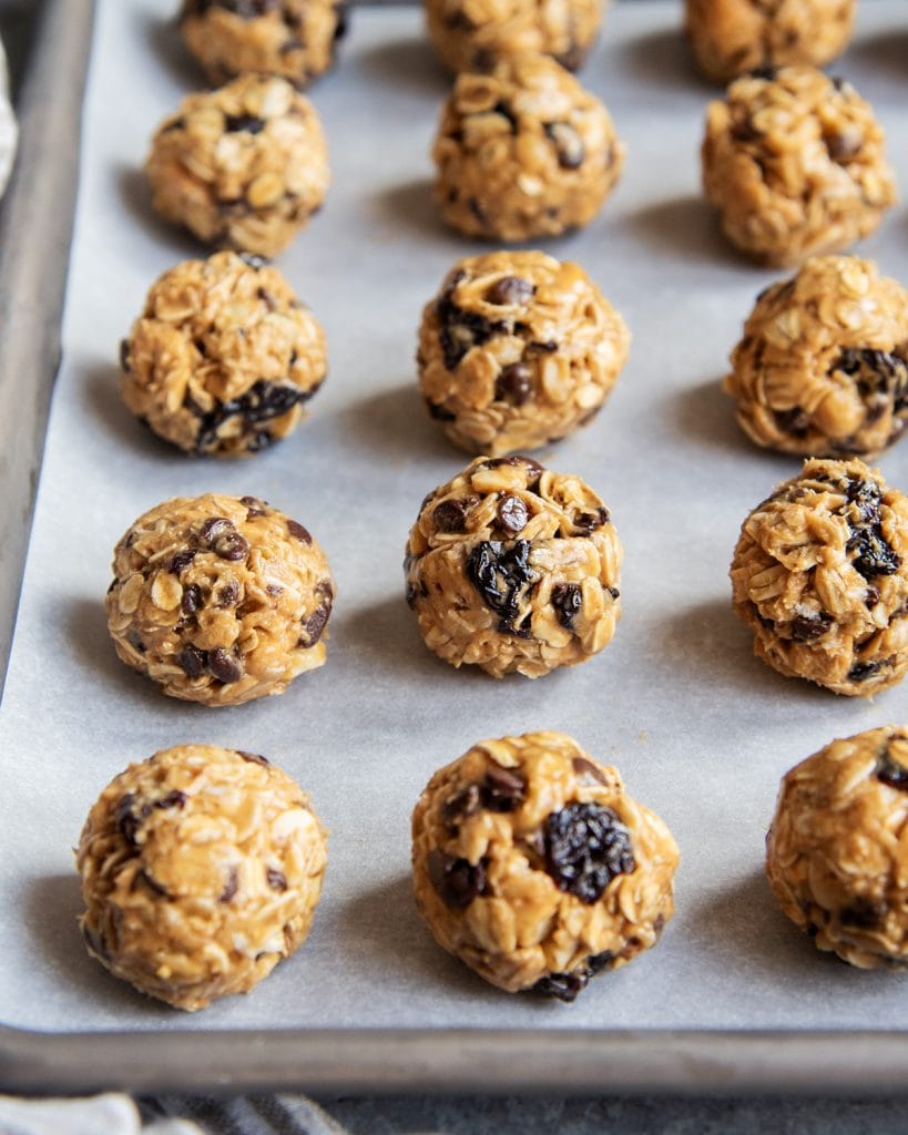 Rows of chocolate and cherry oatmeal energy balls.