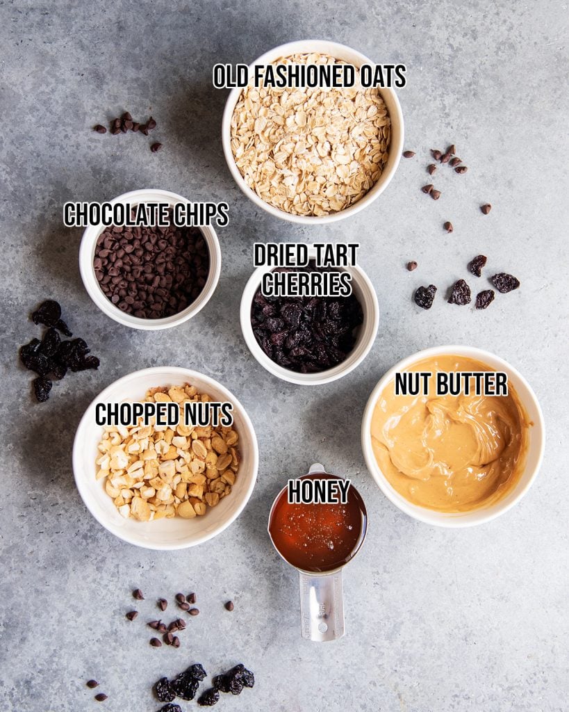 An overhead phot of the 6 ingredients needed to make cherry energy balls.