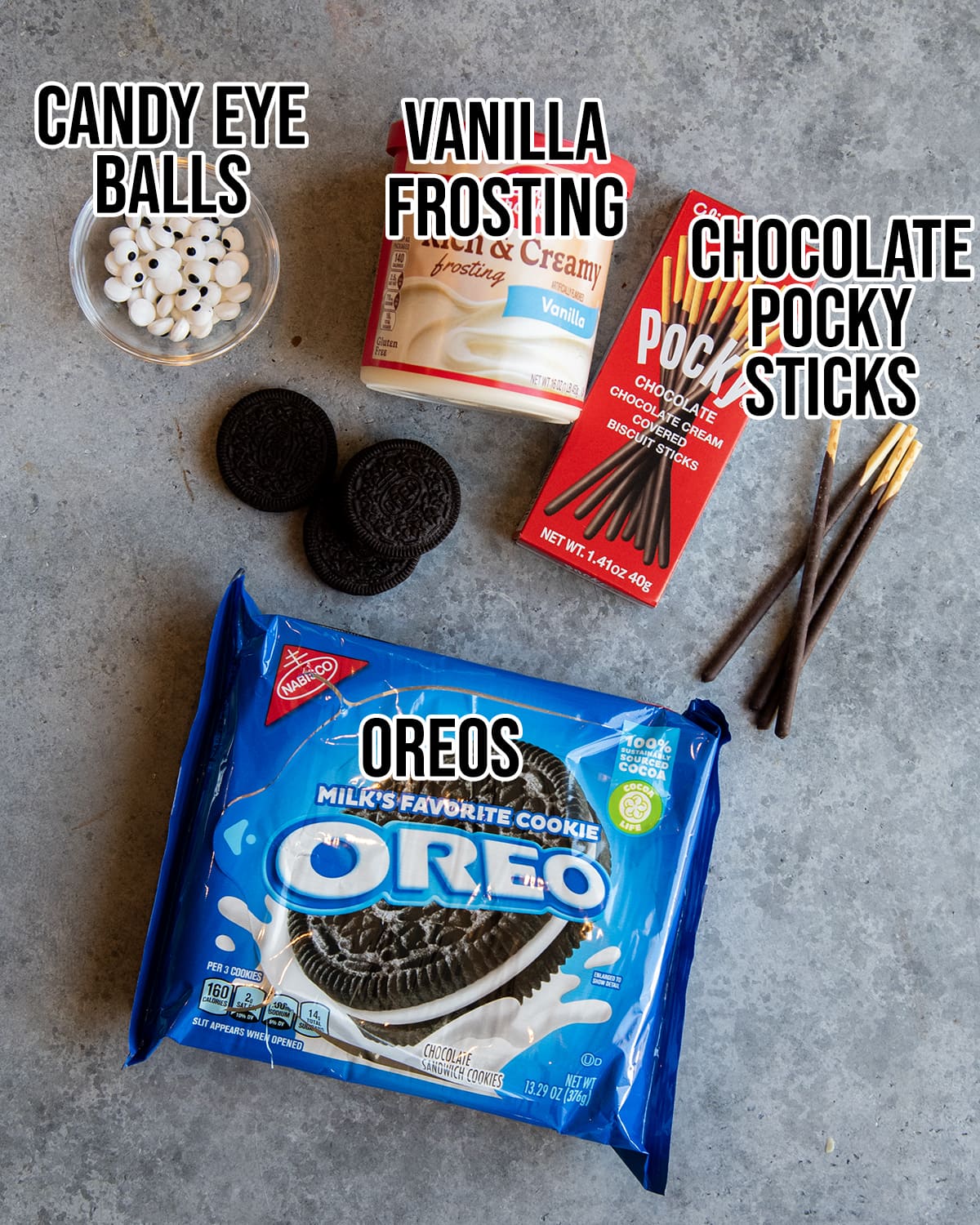 An overhead photo of the 4 ingredients needed to make Oreo Spiders