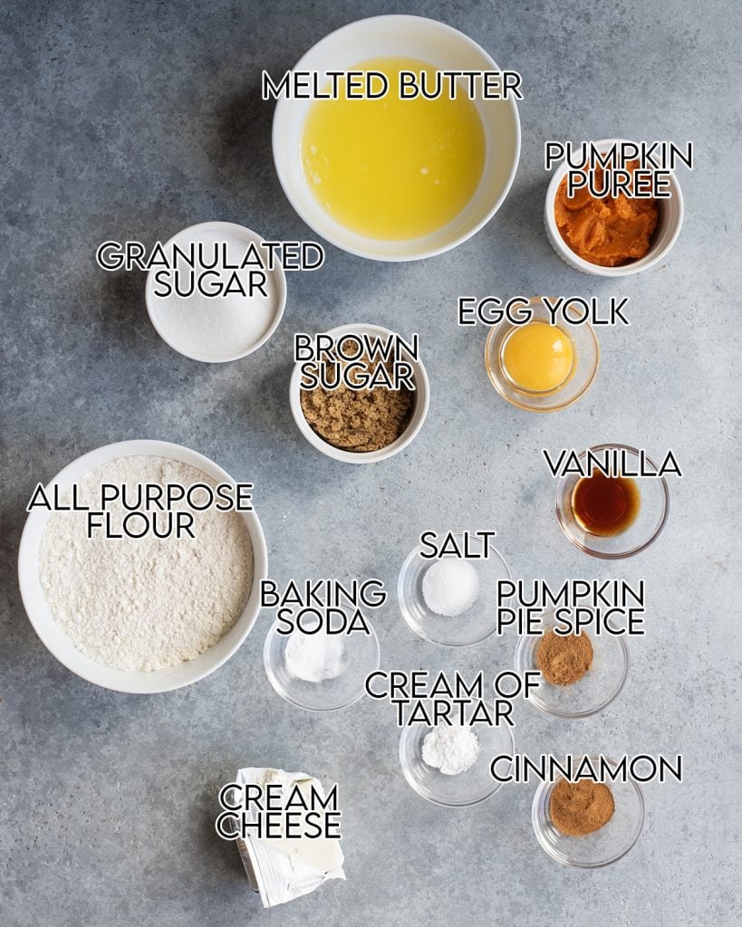 An overhead photo of the ingredients needed to make pumpkin cheesecake cookies.