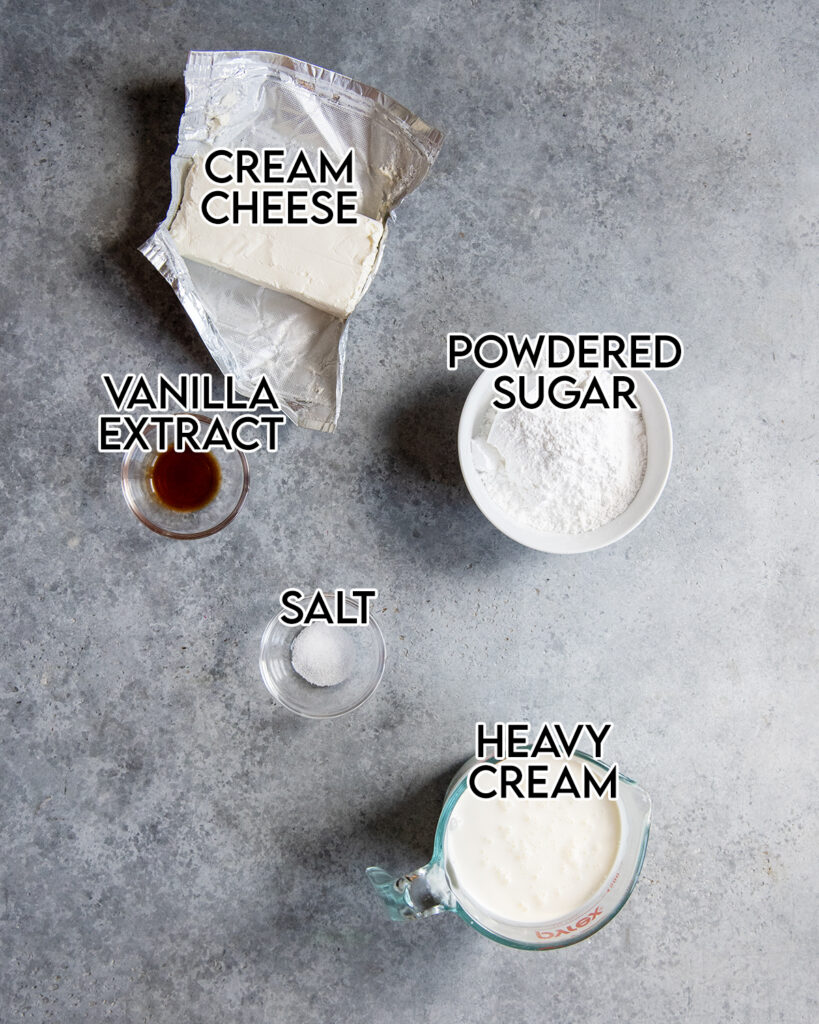 An overhead photo of the ingredients needed to make cream cheese and whipped cream frosting. 