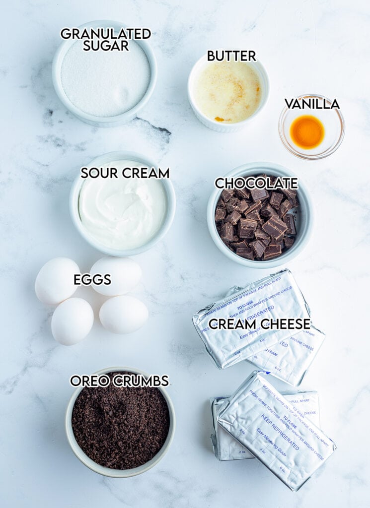 The ingredients needed to make a marble cheesecake.