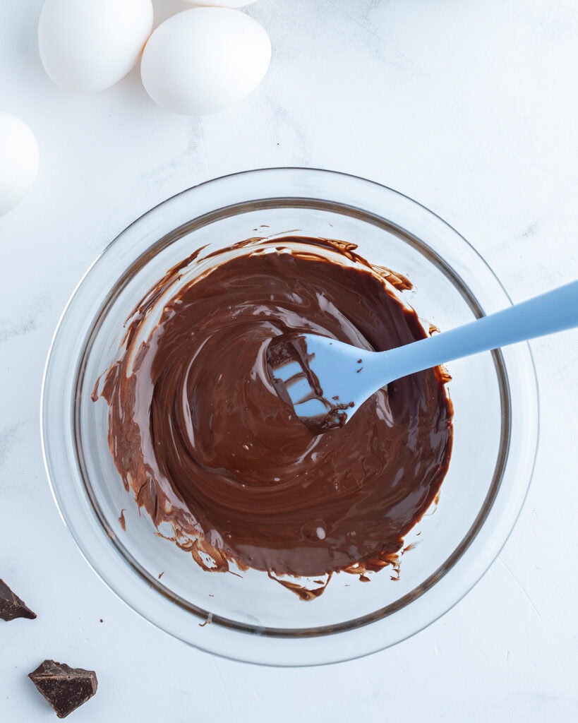 A bowl of melted chocolate.