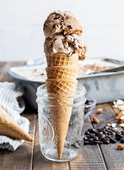 A chocolate ice cream cone set in a glass jar.