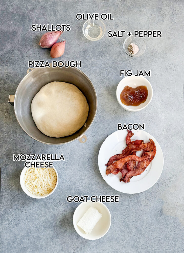 The ingredients needed to make bacon and fig goat cheese pizza.