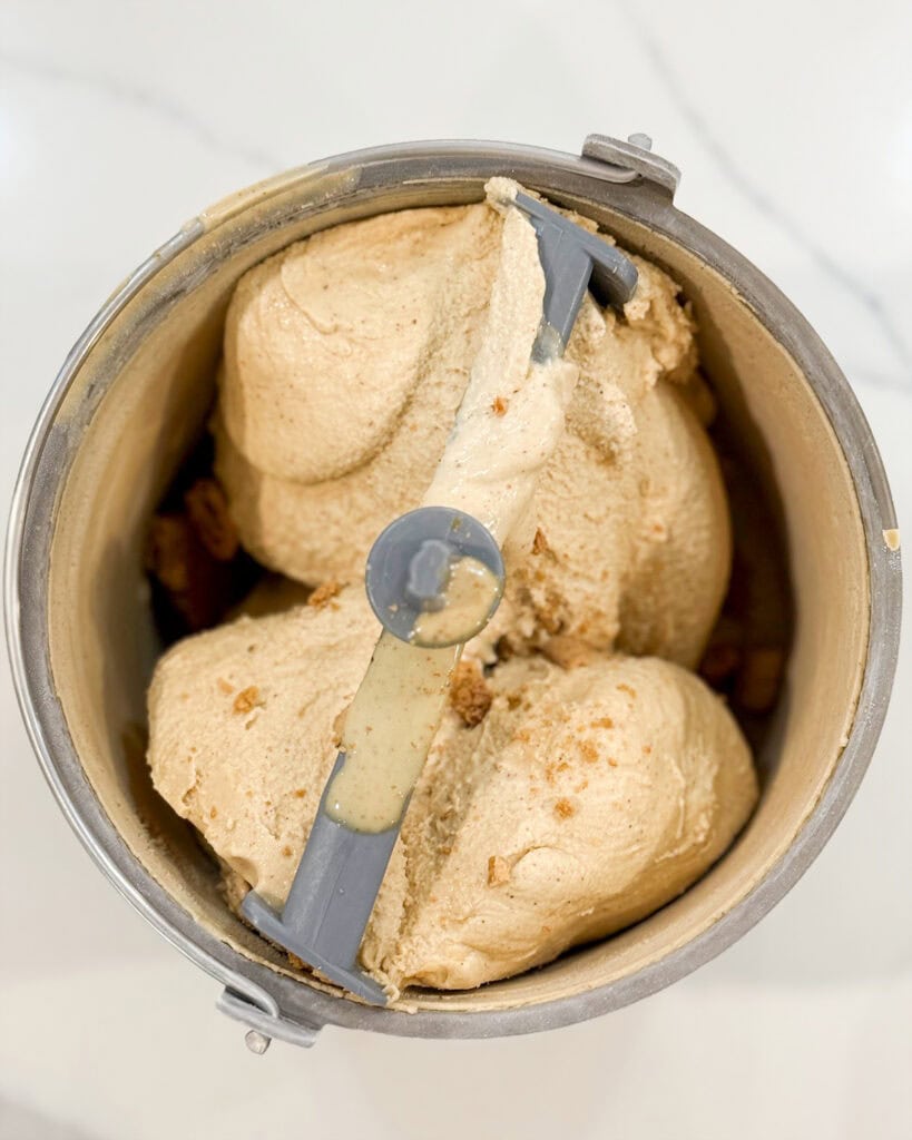Churned ice cream in an ice cream maker.