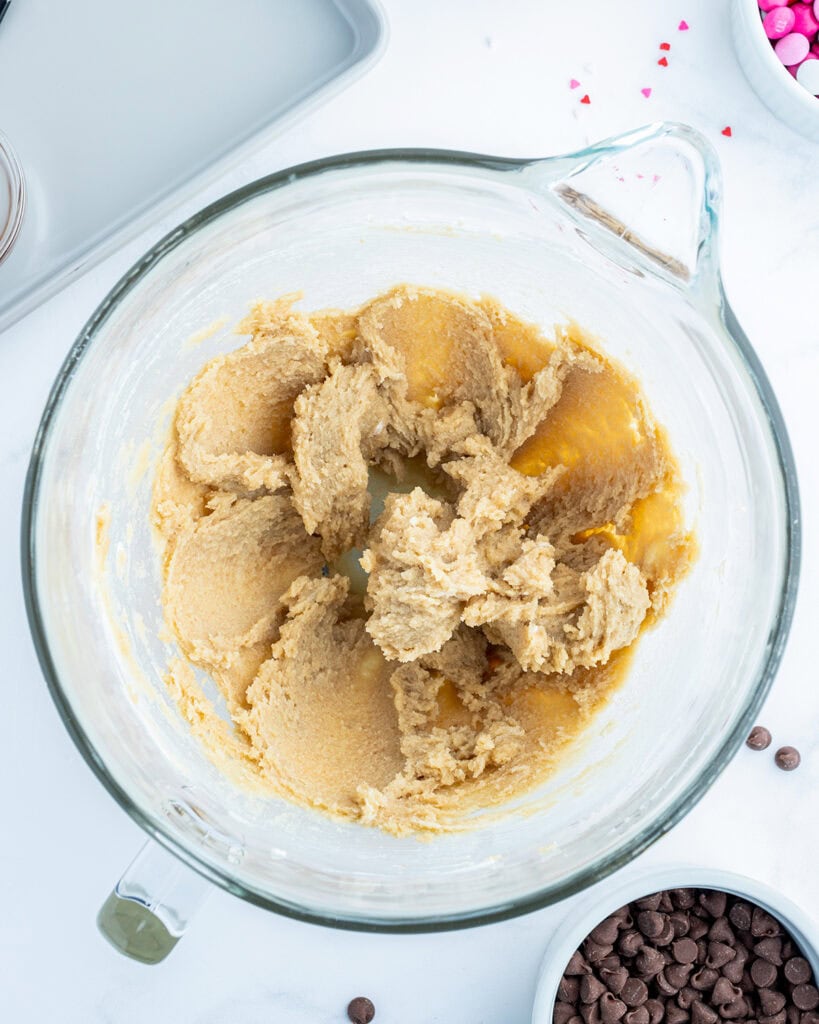Creamed butter and sugar in a glass bowl. 