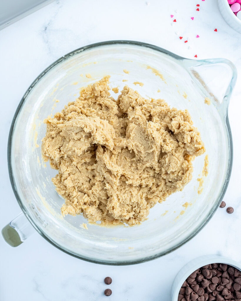 Cookie dough in a mixing bowl.
