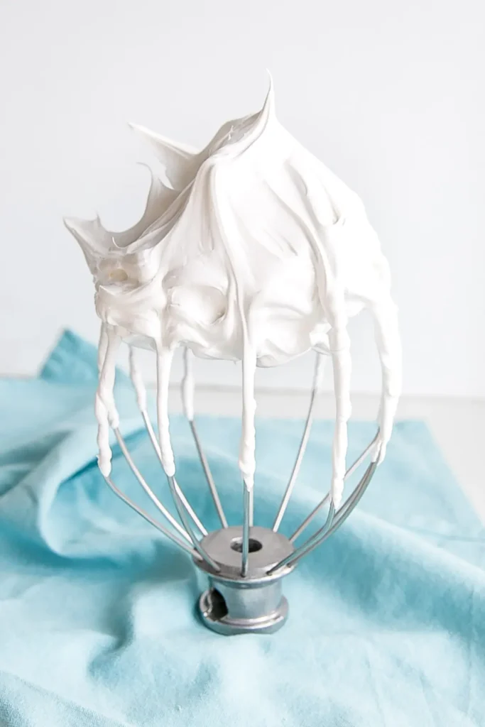 Seven minute frosting on a whisk for a stand mixer. 