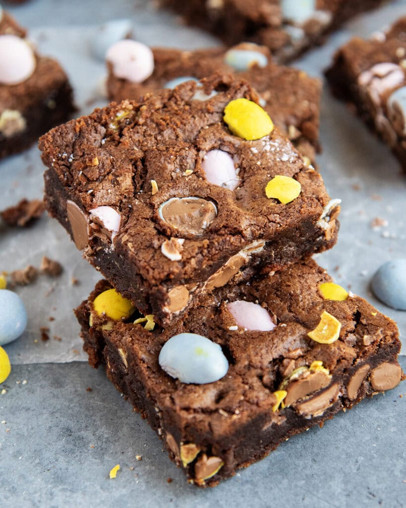 A pile of Mini Cadbury Egg Brownies squares. 