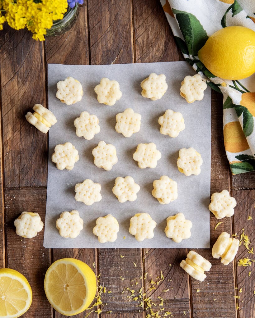 An above view of flower shaped cream wafer cookies.