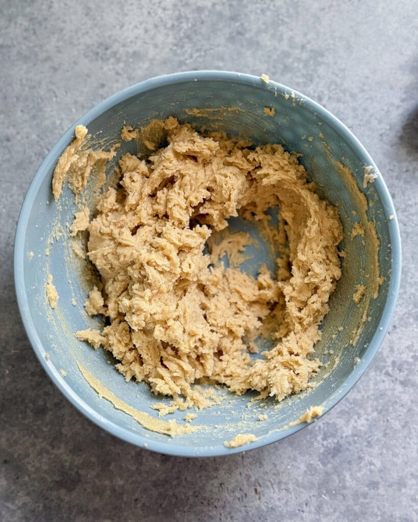 A bowl of creamed butter and sugars. 
