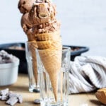 A chocolate ice cream cone set in a glass jar.